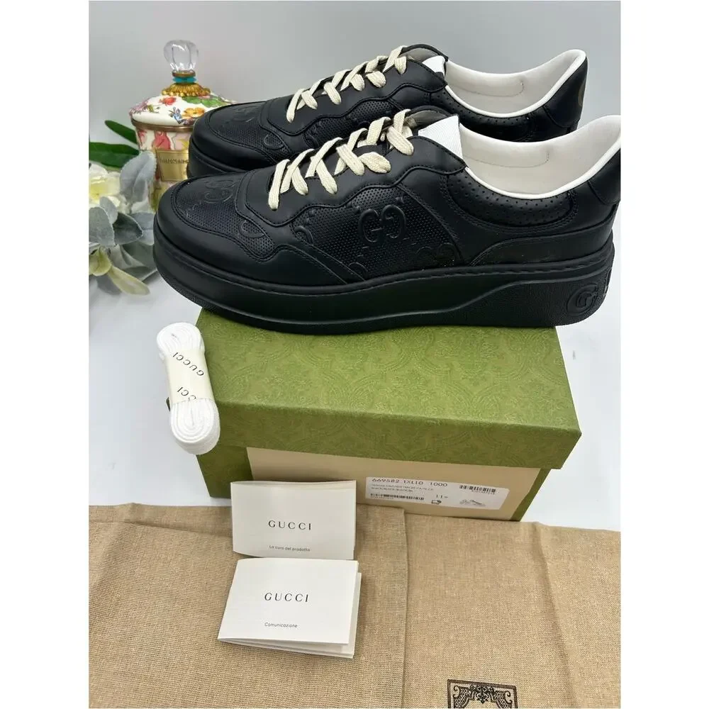 Men's Gucci, GG embossed leather sneakers size 11.5 fits 12 US made in Italy